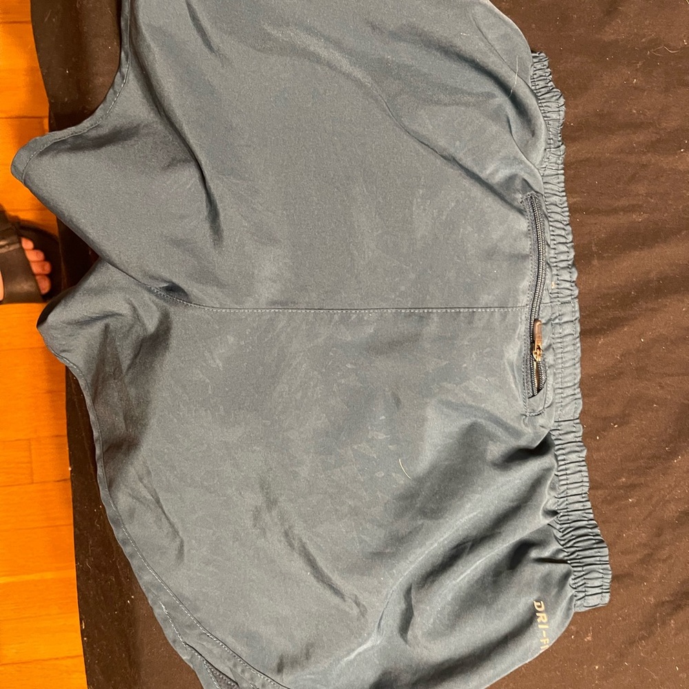 dark teal. never worn. didn’t fit me. size small.